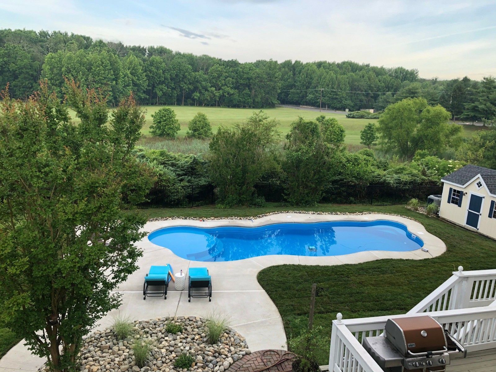 Luxury fiberglass pool with custom decking