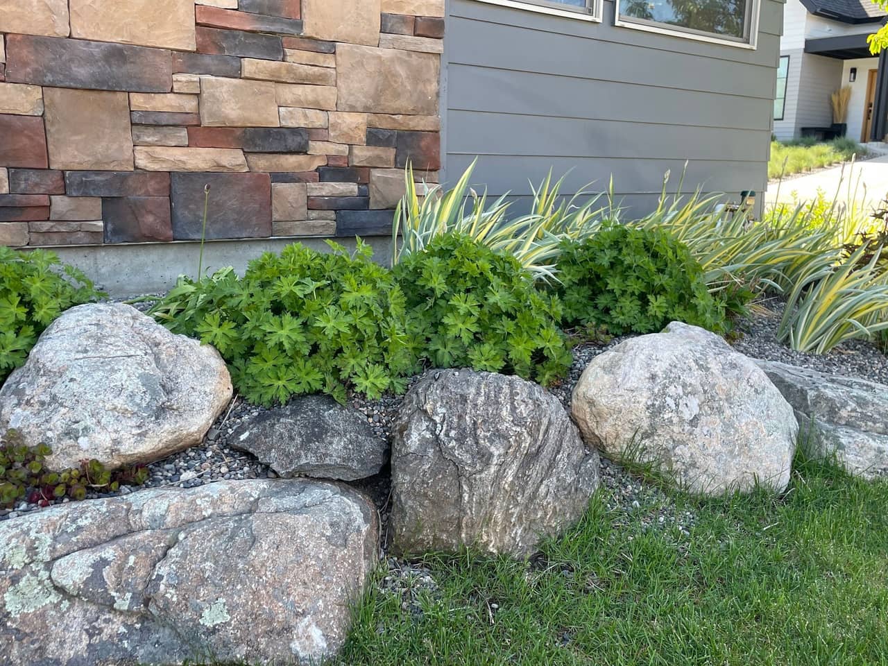 Decorative rock and gravel landscaping installation